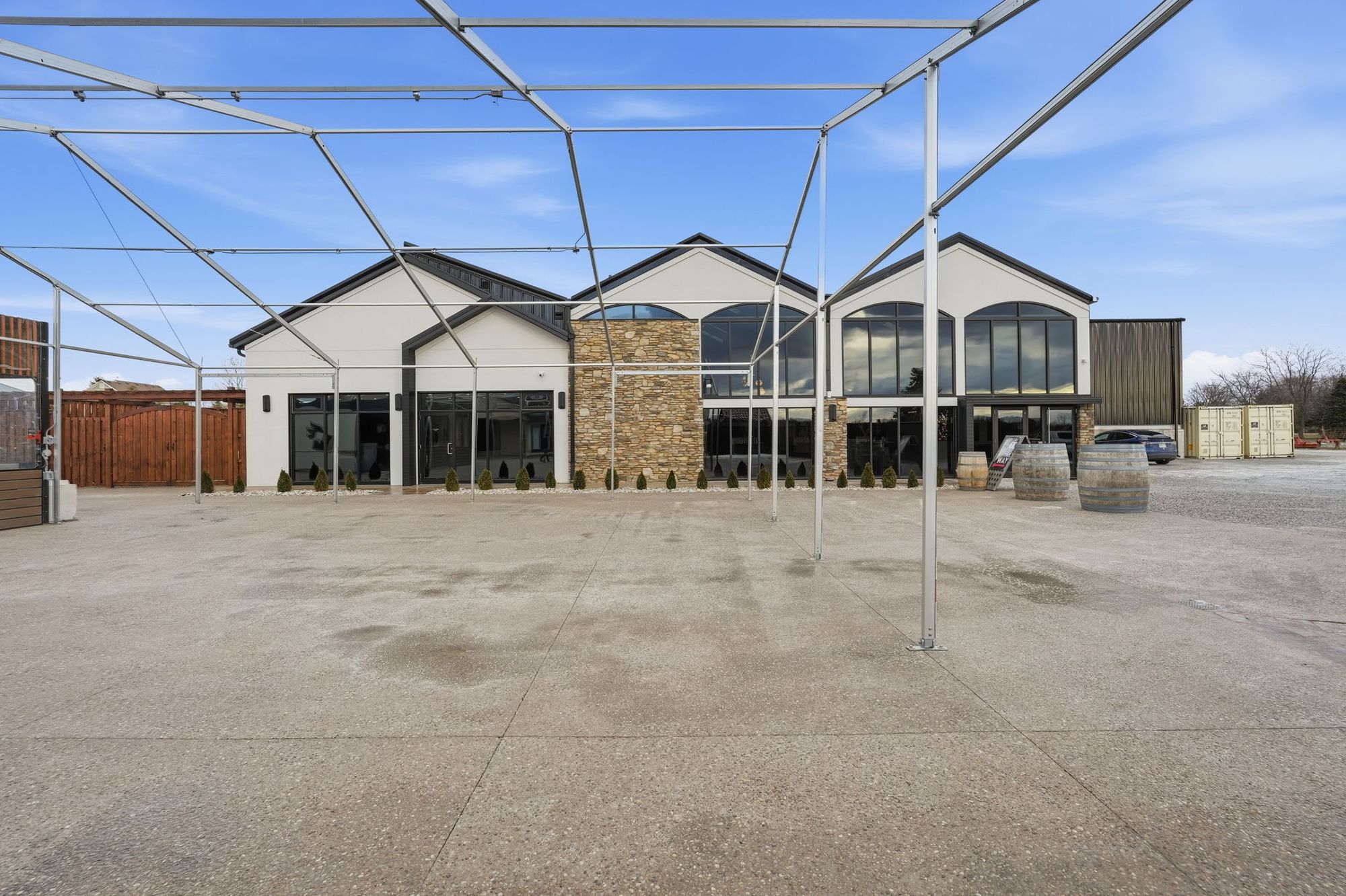 The courtyard in front of the tasting room, under its tent frame