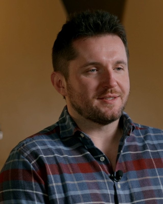 Jakub Lipinski, managing director of Big Head Wines, in front of the oak fermenters (still from the family's film)