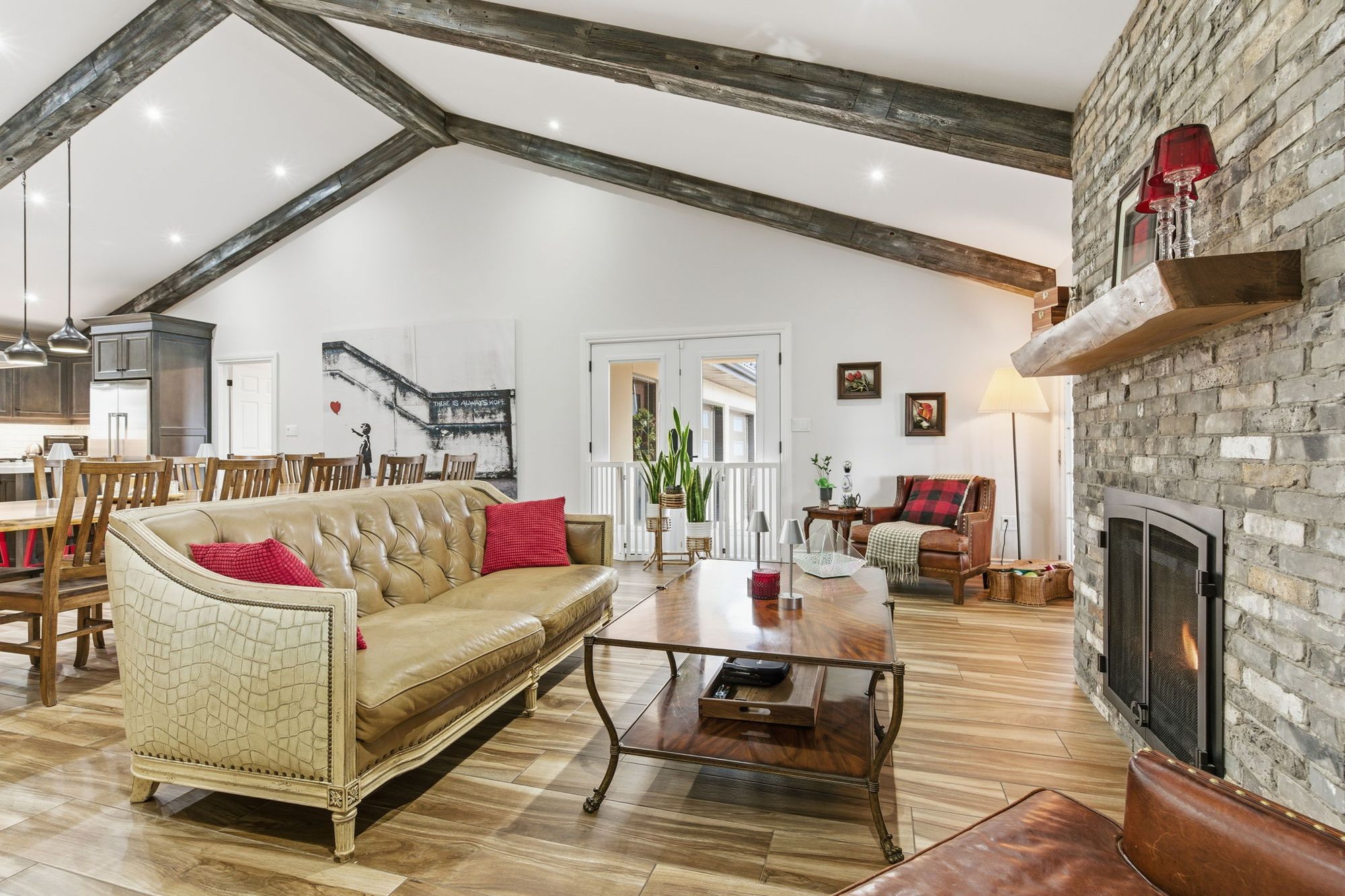 The living room around the stone fireplace