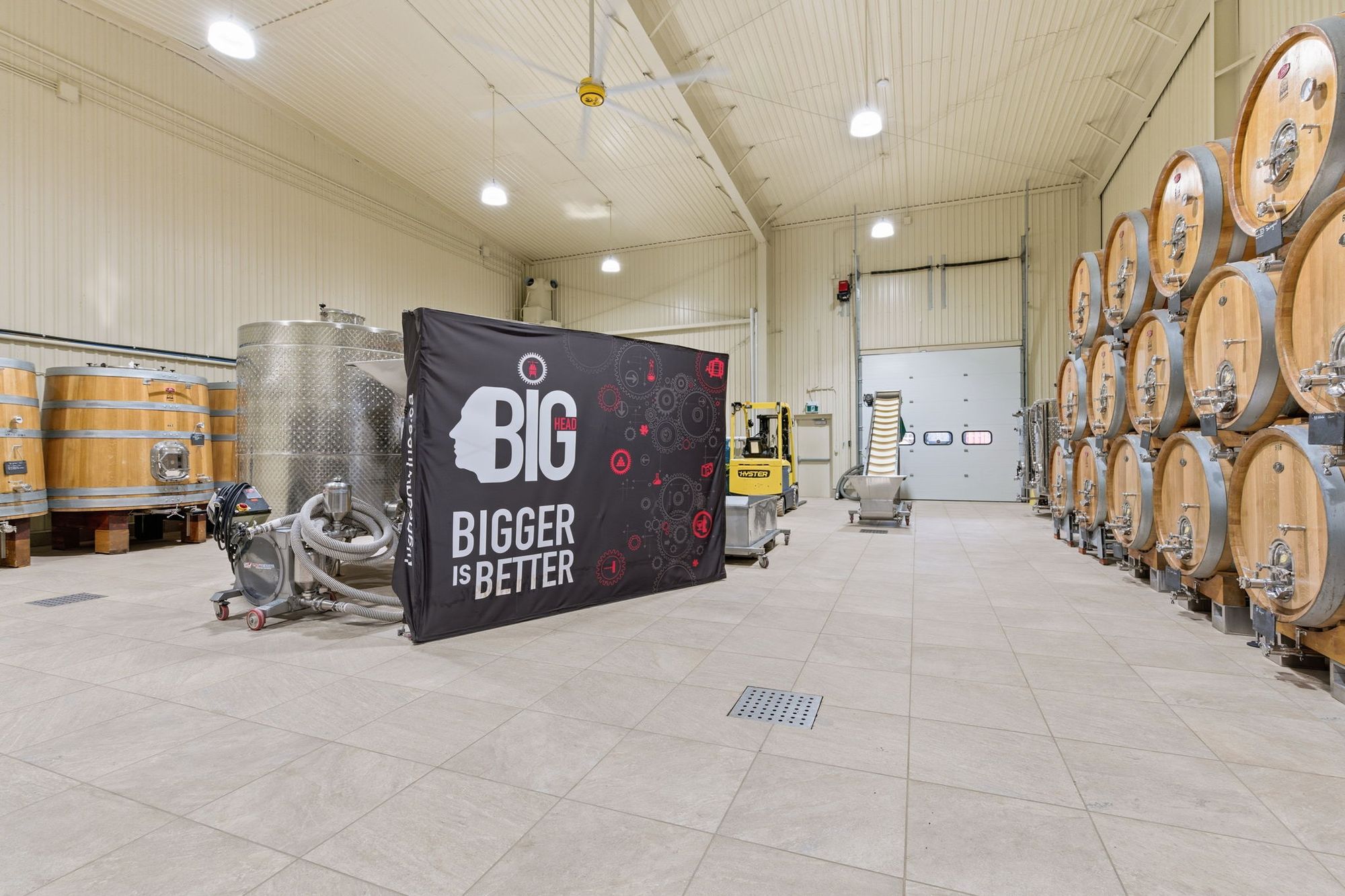 The production hall, with barrels, tanks and a forklift