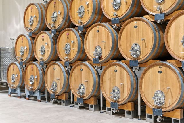 Oak barrels stacked four high